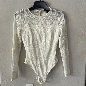 Women’s brand new long sleeve body suit